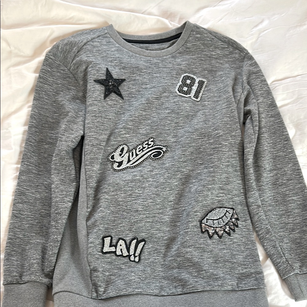 Guess sweater size small has embellishments patches gray color
